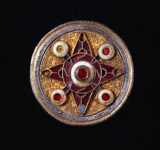 Wingham Brooch, silver-gilt, niello, garnet, glass and shell, 575–625, found in England. British Museum curated Medieval Power exhibition at the Queensland Museum.