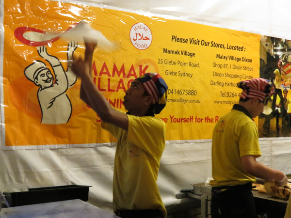 Man making roti at Mamak Village stall during Night Noodle Markets at the Crave Sydney International Food Festival.