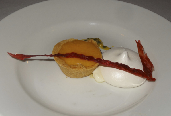 Passionfruit curd in shortcrust pastry with dried rhubarb, yoghurt mousse and meringue.