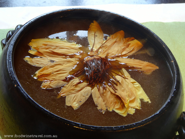 www.foodwinetravel.com.au Lotus flower in broth, Shi Yang restaurant on the outskirts of Taipei. Taiwanese food.