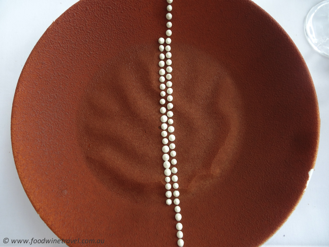 Aboriginal-inspired Daintree chocolate, wattleseed custard and vanilla curd dessert, created by Josue Lopez for GoMA restaurant in Brisbane’s Gallery of Modern Art. Photo © www.foodwinetravel.com.au