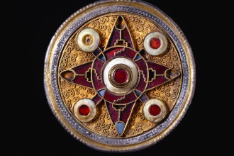 Wingham Brooch, silver-gilt, niello, garnet, glass and shell, 575–625, found in England. British Museum curated Medieval Power exhibition at the Queensland Museum.