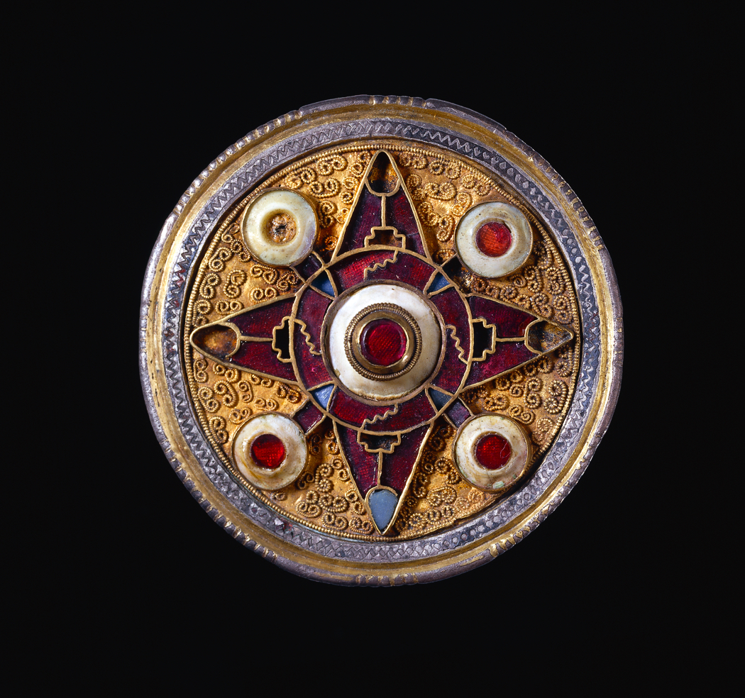 Wingham Brooch, silver-gilt, niello, garnet, glass and shell, 575–625, found in England. British Museum curated Medieval Power exhibition at the Queensland Museum.