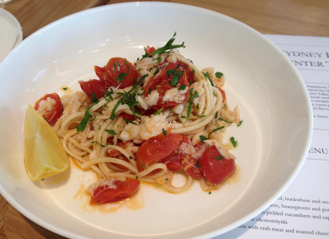 Prawn oil pasta with crab meat and slow-roasted cherry tomatoes
