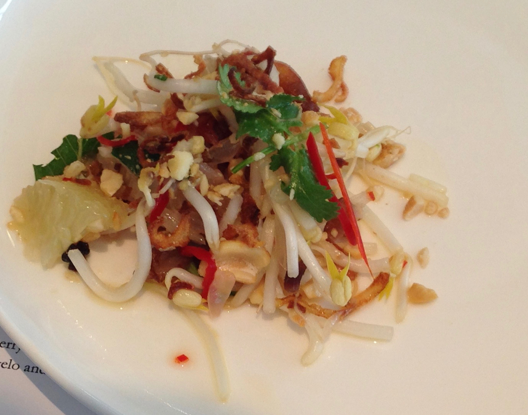 Sticky pork salad with shallots, beansprouts and pomelo