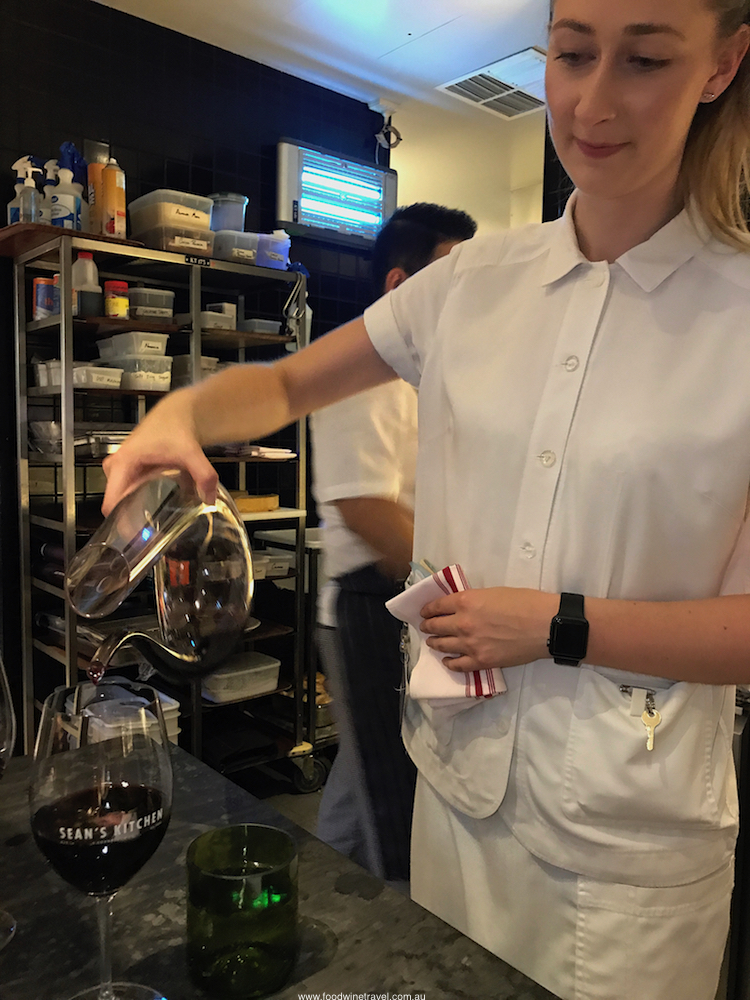 Sean's Kitchen Bec pouring wine