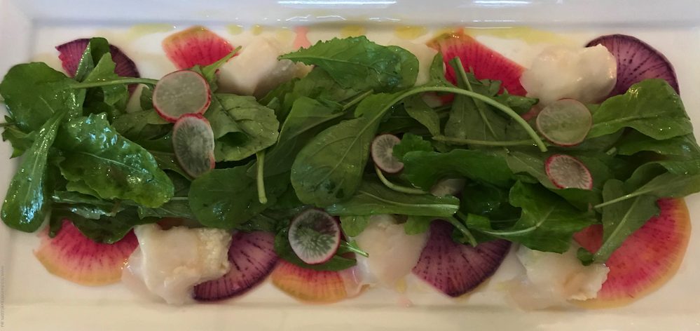 Whidbey Island Orchard Kitchen Olive Oil Poached Halibut and Geoduck Sashimi Salad of Arugula, Shaved Radish & Rhubarb Mignonette