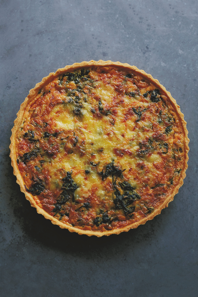 Cheddar onion and spinach tart, from How To Eat A Peach