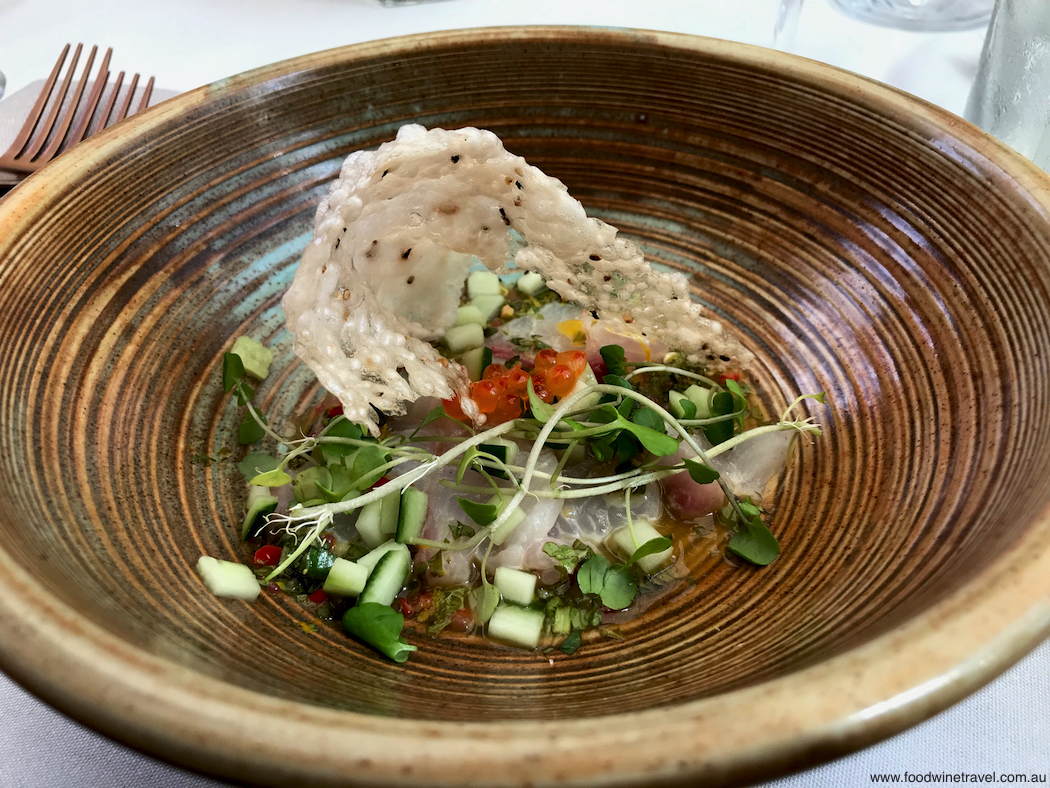 Coral trout crudo with cucumber, salmon roe and finger lime crisp.