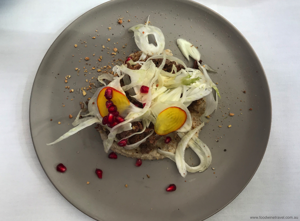 Braised lamb shoulder with baba ganoush, pistachio dukkah, shaved fennel and pomegranate.