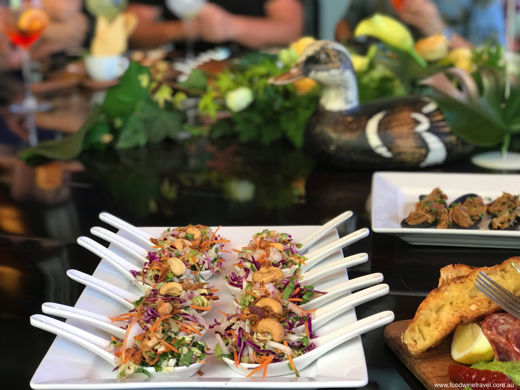 Asian-style grilled prawn and cashew with tangy lime chill dressing, at Esco. Four great restaurants at Sanctuary Cove Queensland.