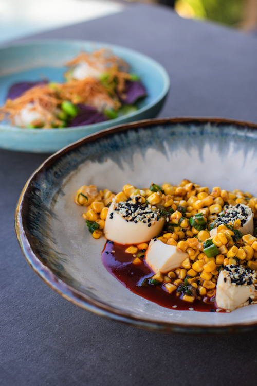 Silken tofu with sautéed corn and a hot, sweet/salty dressing.