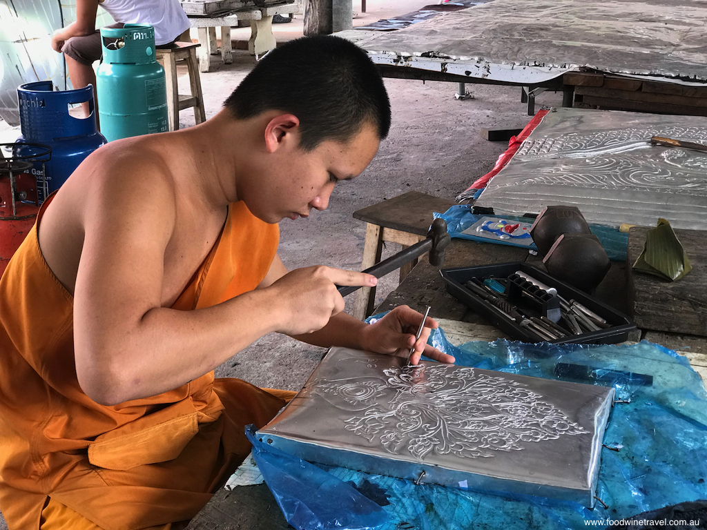 A young monk in the silver workshops near the Silver Temple.