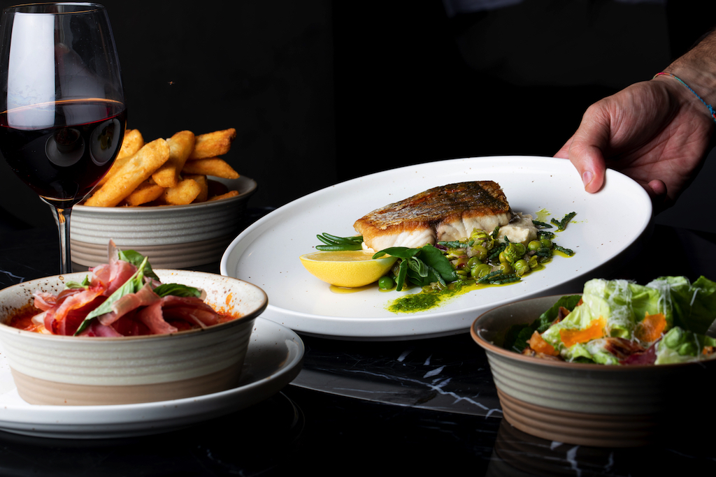 Western Australian barramundi with cauliflower and pea salsa.