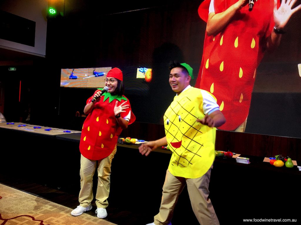 Crew members get into the spirit of the Fruit Hat competition.