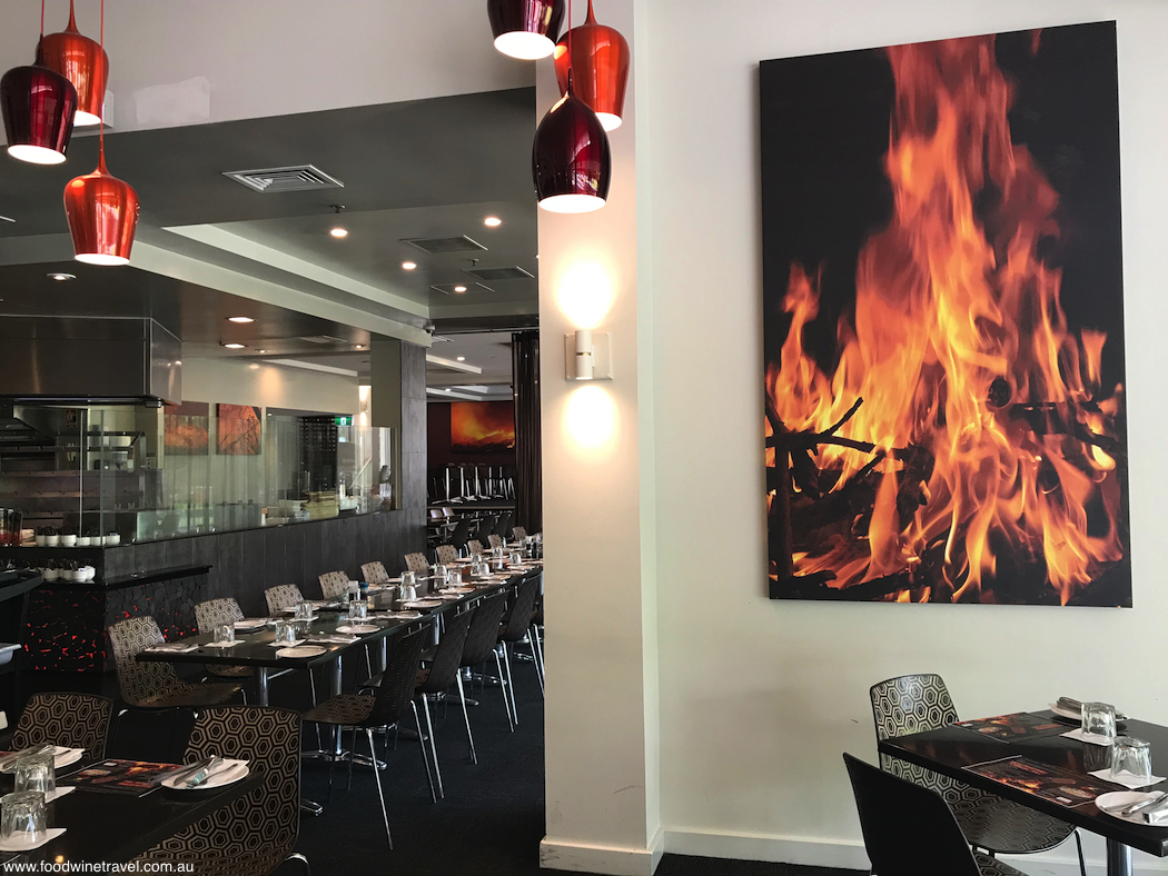 Pacific Hotel Cairns Bushfire Flame Grill Restaurant offers a Brazilian-style churrasco experience