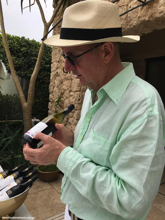 Winemaker and managing director of Taylors Wines, Mitchell Taylor, points out  sensors indicating the wine's temperature.