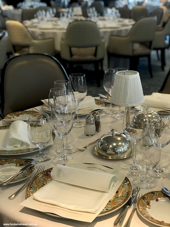 The Grand Dining Room is very elegant with tables set with Riedel crystal and Versace china.