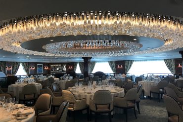 It took three weeks just to assemble the chandelier in the Grand Dining Room of Oceania Cruises’ new-look Insignia