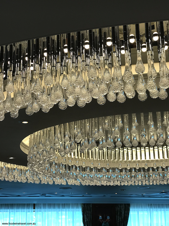 The impressive chandelier in the Grand Dining Room is made from handblown teardrops of Italian glass.