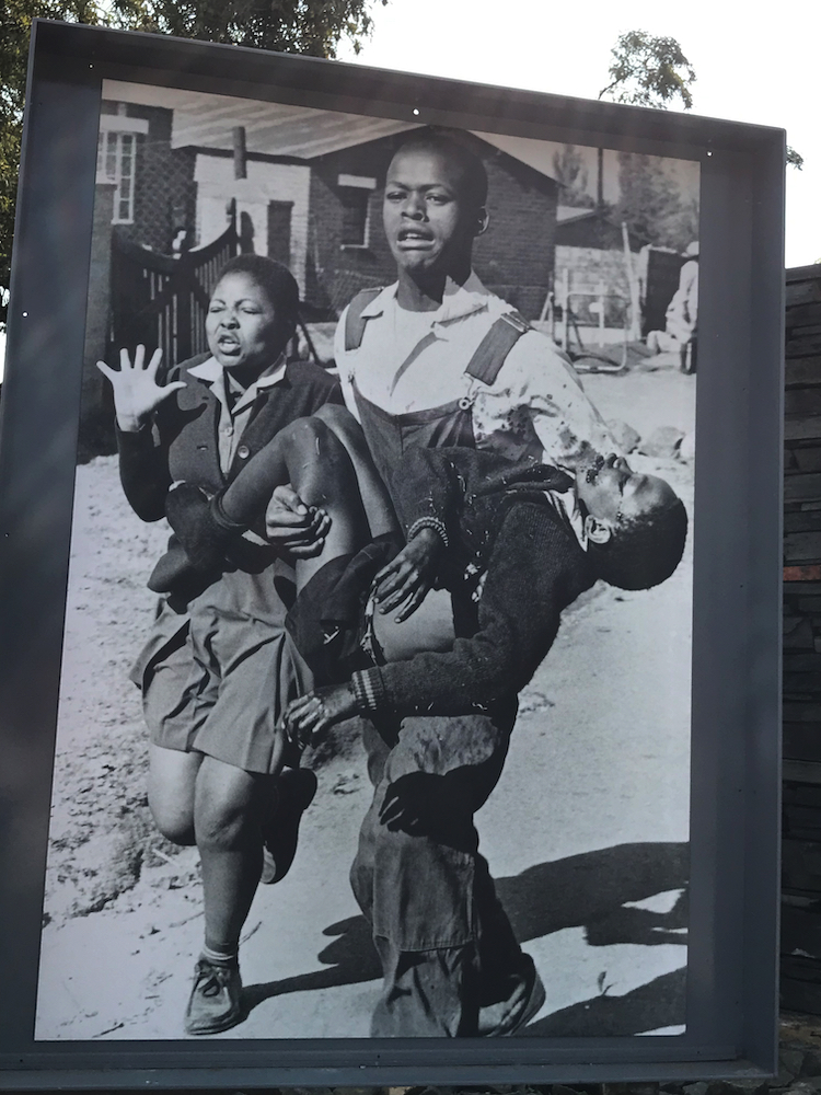 Antoinette and her dying brother, Hector Pieterson, in Sam Nzima's iconic photo.