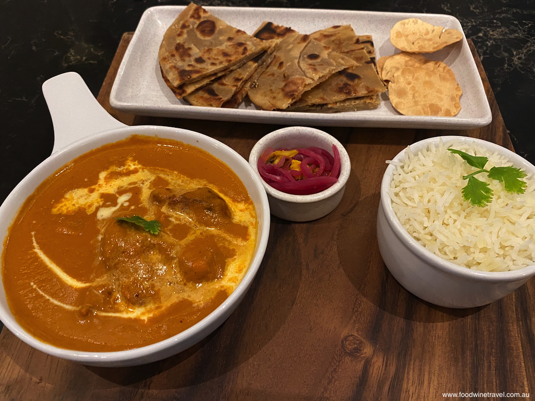 Hotel Grand Windsor Auckland Butter chicken with steamed rice paratha homemade pickle and poppadum