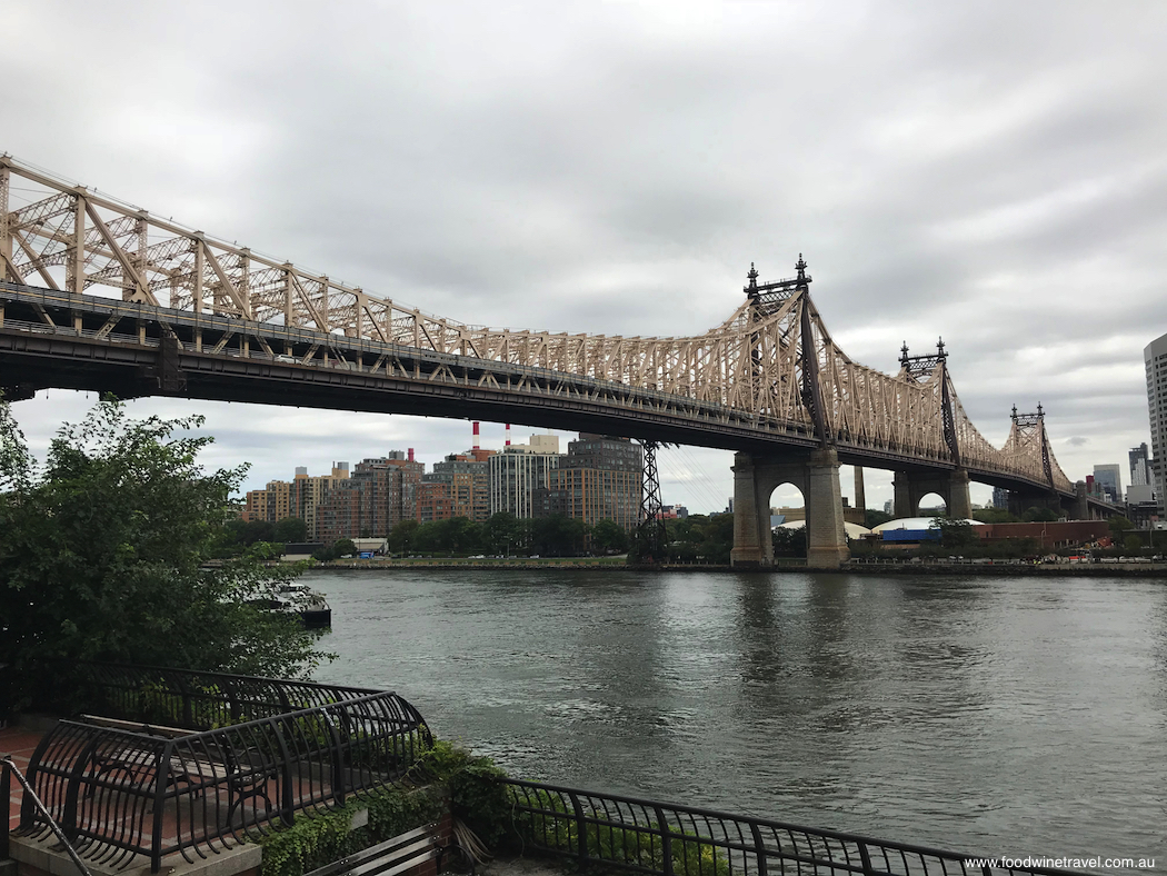 The Queensboro Bridge, also known as 59th Street Bridge, viewed from Sutton Square where Woody Allen sits on a park bench in Manhattan and says, “This is really a great city”.  New York movie tour