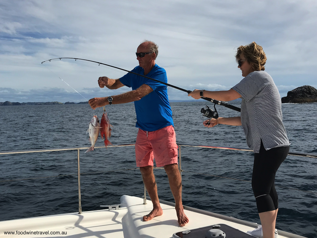 Success ... fishing in New Zealand's Bay of Islands.