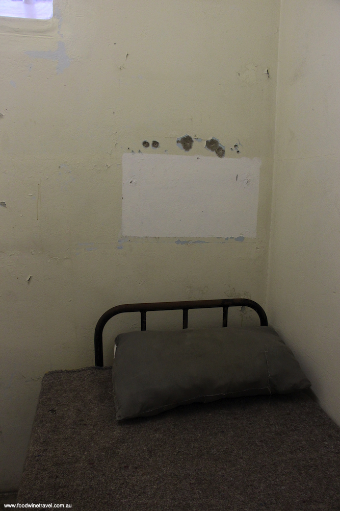 Inside Mandelas cell Robben Island Cape Town sites associated with Nelson Mandela