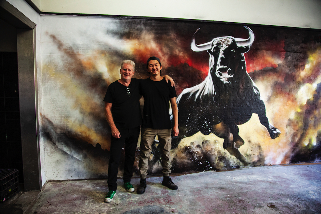 The Bull Bar's Wayne Tindall and street artist Heesco Khosnaran.