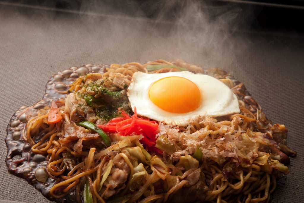 Noodles cooked on a teppanyaki hotplate are a speciality at family-run Fuku-chan restaurant.