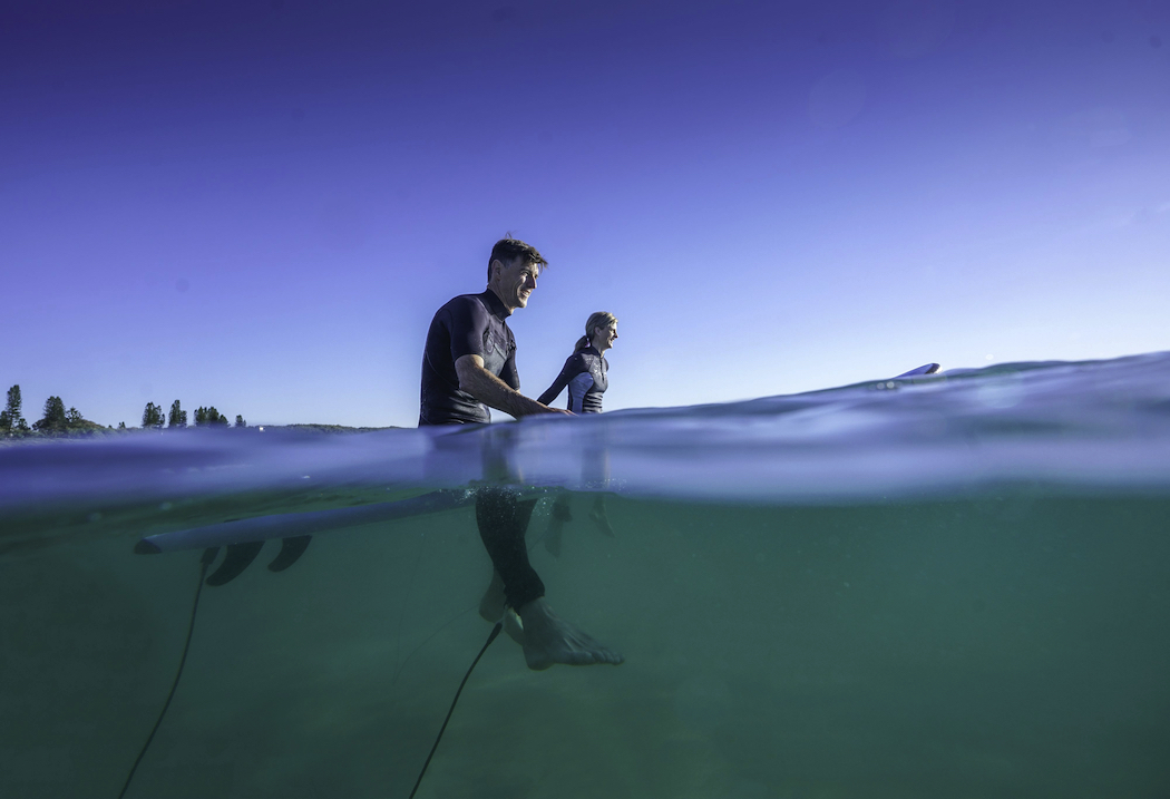 Book a surfing lesson with Coolum Surf School on Queensland's Sunshine Coast.