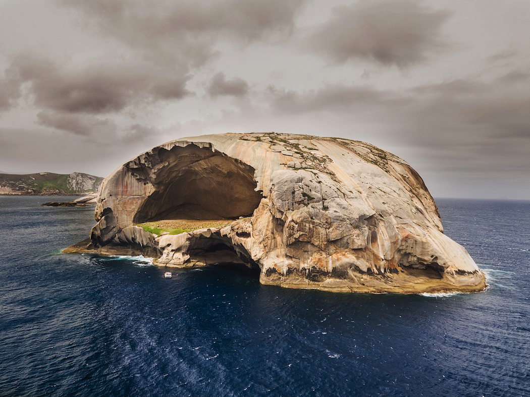 Skull Rock, one of the awesome sights you'll see on a boat cruise with Pennicott Wilderness Journeys.