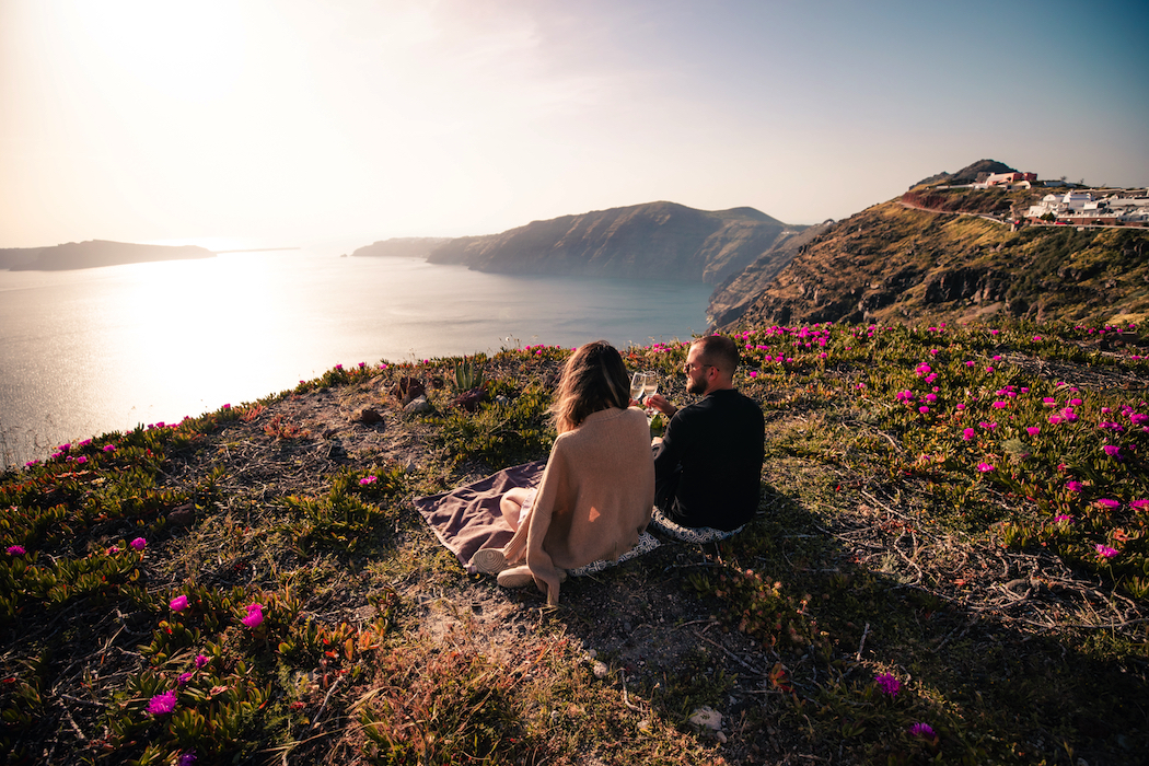 Catch the sunset with a private picnic organized by Santorini Secret Suites & Spa.