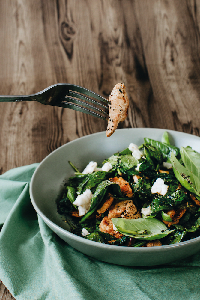 Recipe for Stir-fried chicken and basil salad on just-wilted spinach, from Eat Your Way Slim & Healthy.
