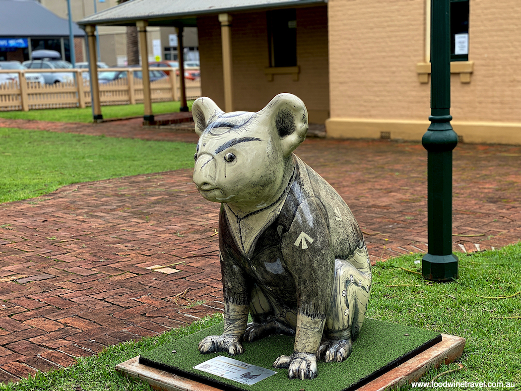 The ‘convict’ koala outside the Old Port Macquarie Courthouse (1869), a heritage-listed former courthouse and now museum. 