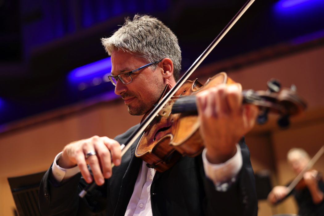 Principal viola, Imants Larsens, in a solo performance of Romance in F Op. 85.