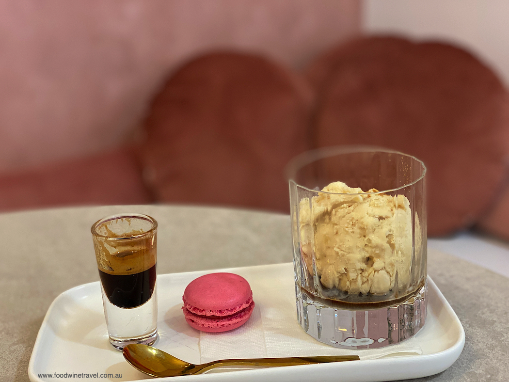 Rosé Gelateria's affogato with rock salt caramel gelato and raspberry macaron.