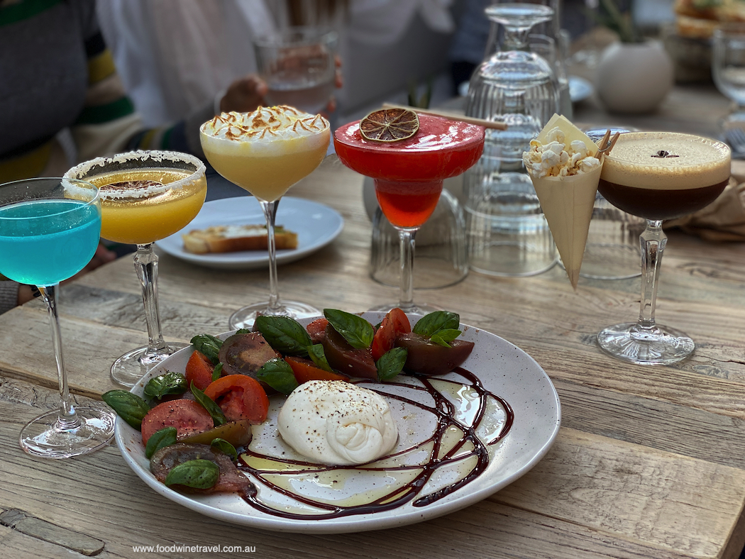 Vannella burrata cheese and heirloom tomatoes with Destino's awesome cocktails.