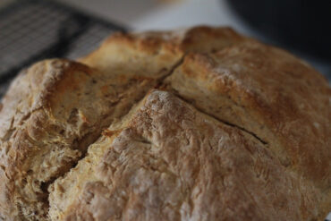 Irish folklore dictates that a deep cross must be cut into the top of soda bread. Do you know why?