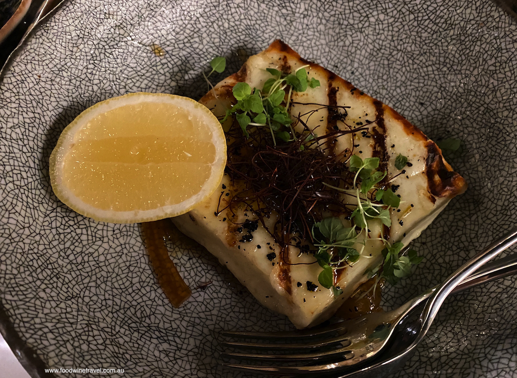 Grilled halloumi with fennel glyko, lemon and isot pepper.