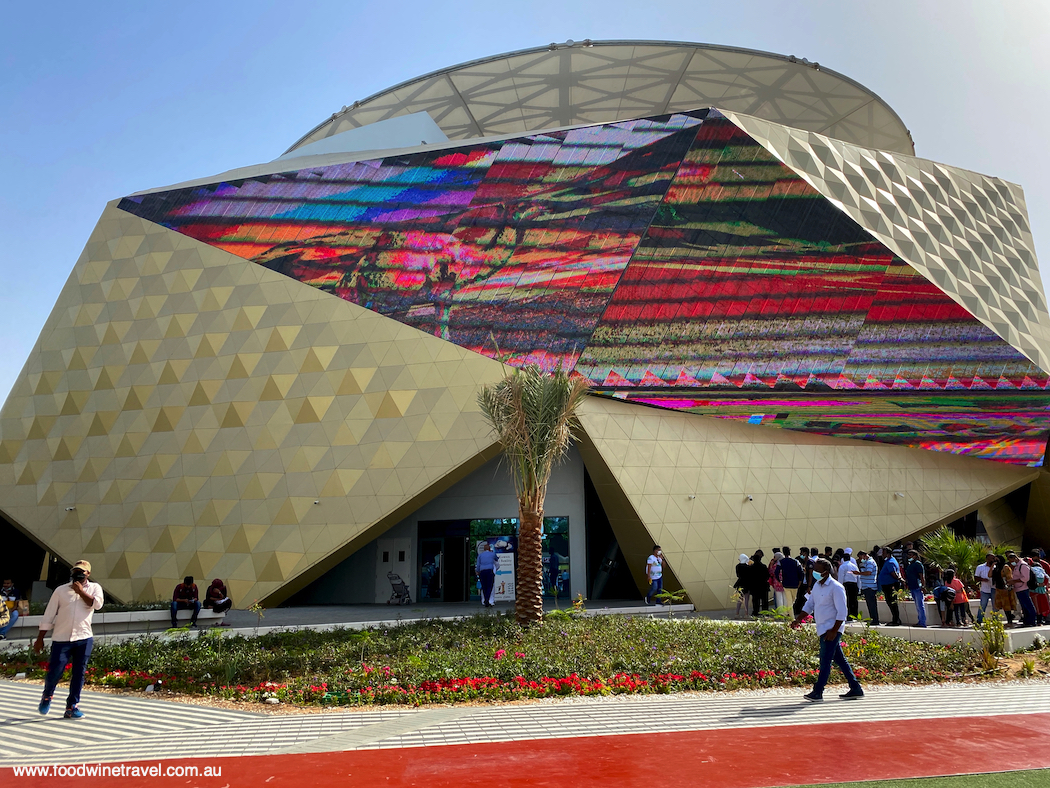 Influenced by the shapes of the nation's water towers, sun and sand, the Kuwait Pavilion was a grand golden structure, made of countless triangles.