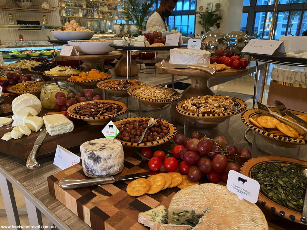 A whole station just of cheeses, nuts, and dried fruit.