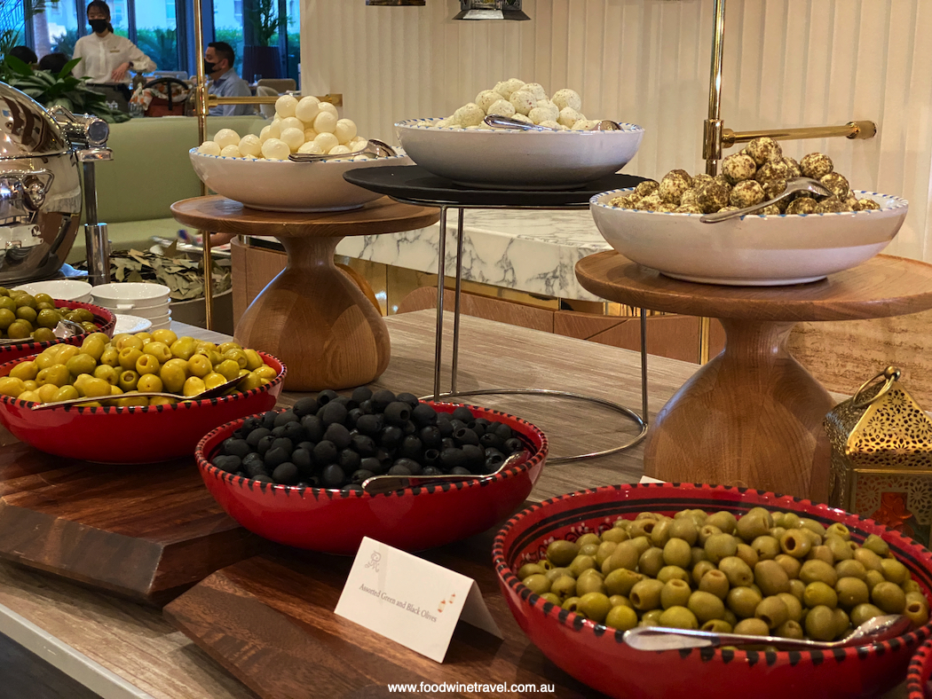 Olives and various types of labneh balls among the cold mezze on offer.