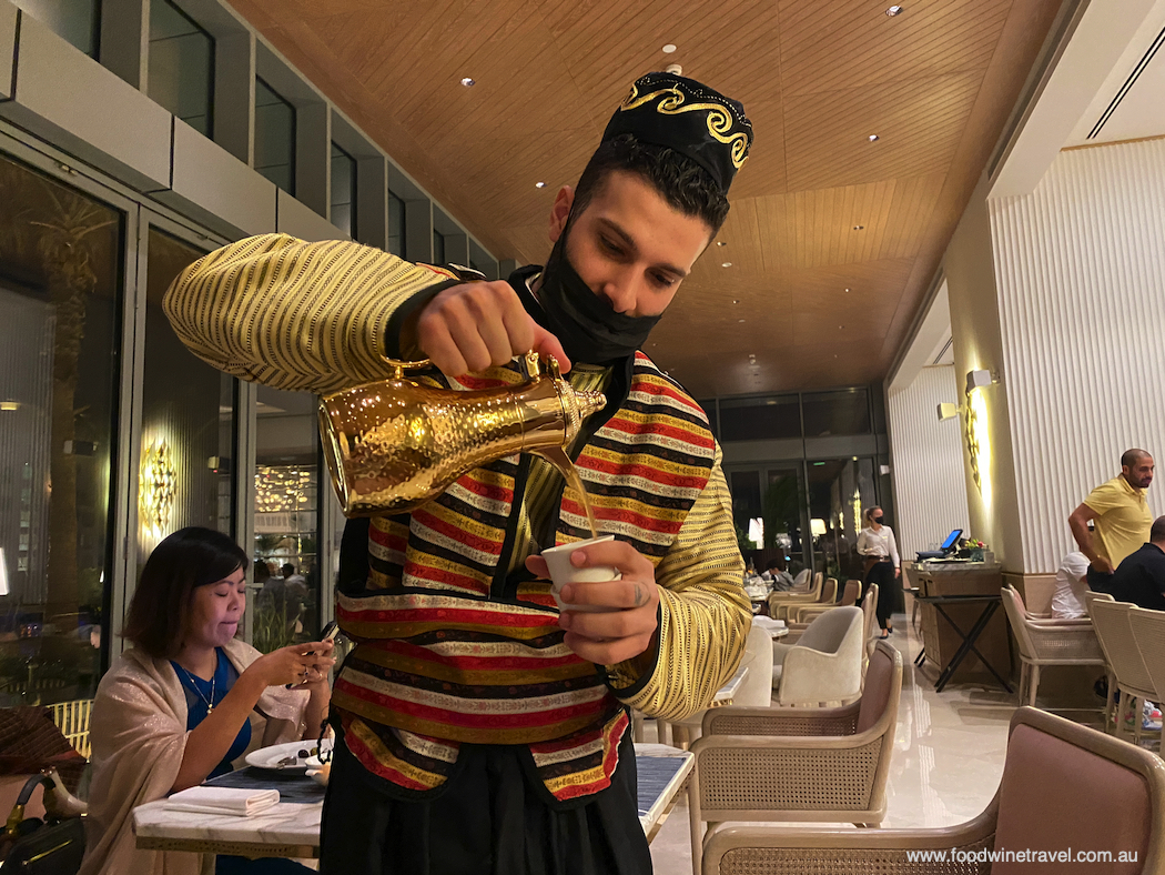 Ramadan in July: One of the waiters serving Arabic coffee.
