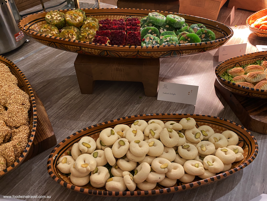 A selection of Turkish delight and ghraibeh (Middle Eastern shortbread cookies) with pistachio.