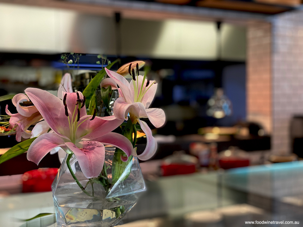 Brisbane's best steakhouses. Sweet-smelling lillies add to the ambience.