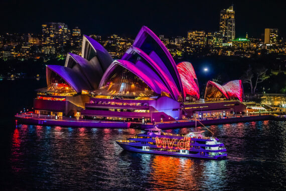 Captain Cook Cruises' Sydney 2000 passing the Sydney Opera House during Vivid Sydney 2019.