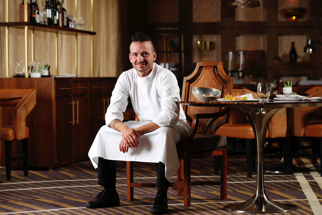 Chef Isaia Dal Fiume at Bacchus restaurant. Photo by Josh Woning.