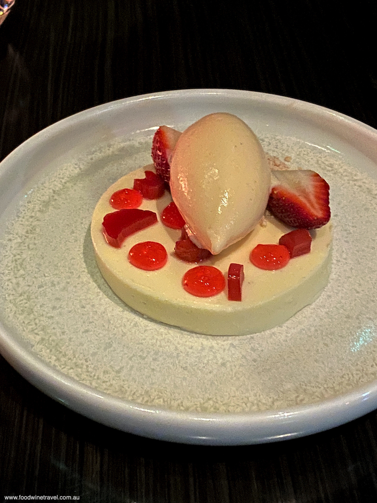 Vanilla bean panna cotta with strawberry gum and rhubarb gel, ginger crumble, and ginger icecream. Yum!